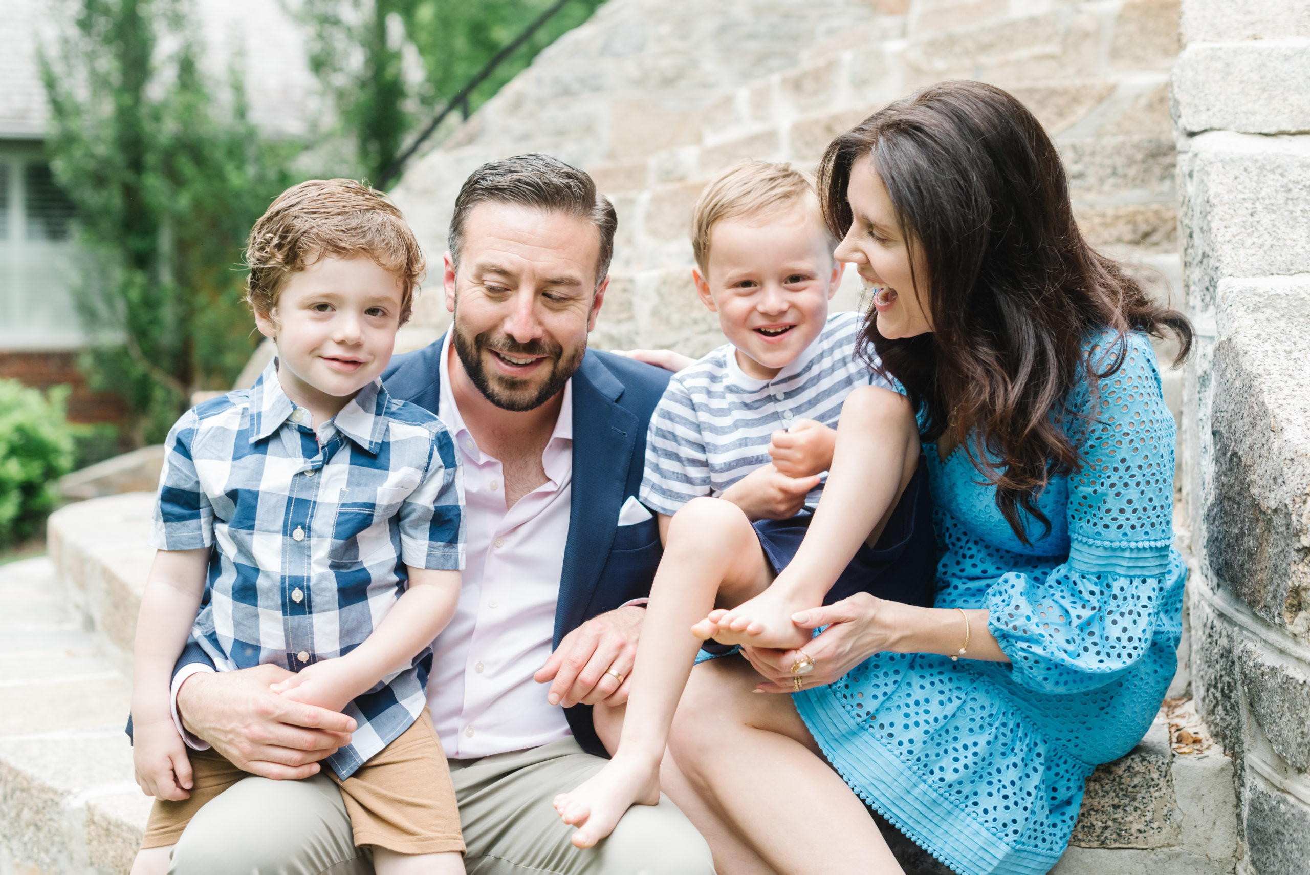 Candid photo of laughing family during Washington, DC family session