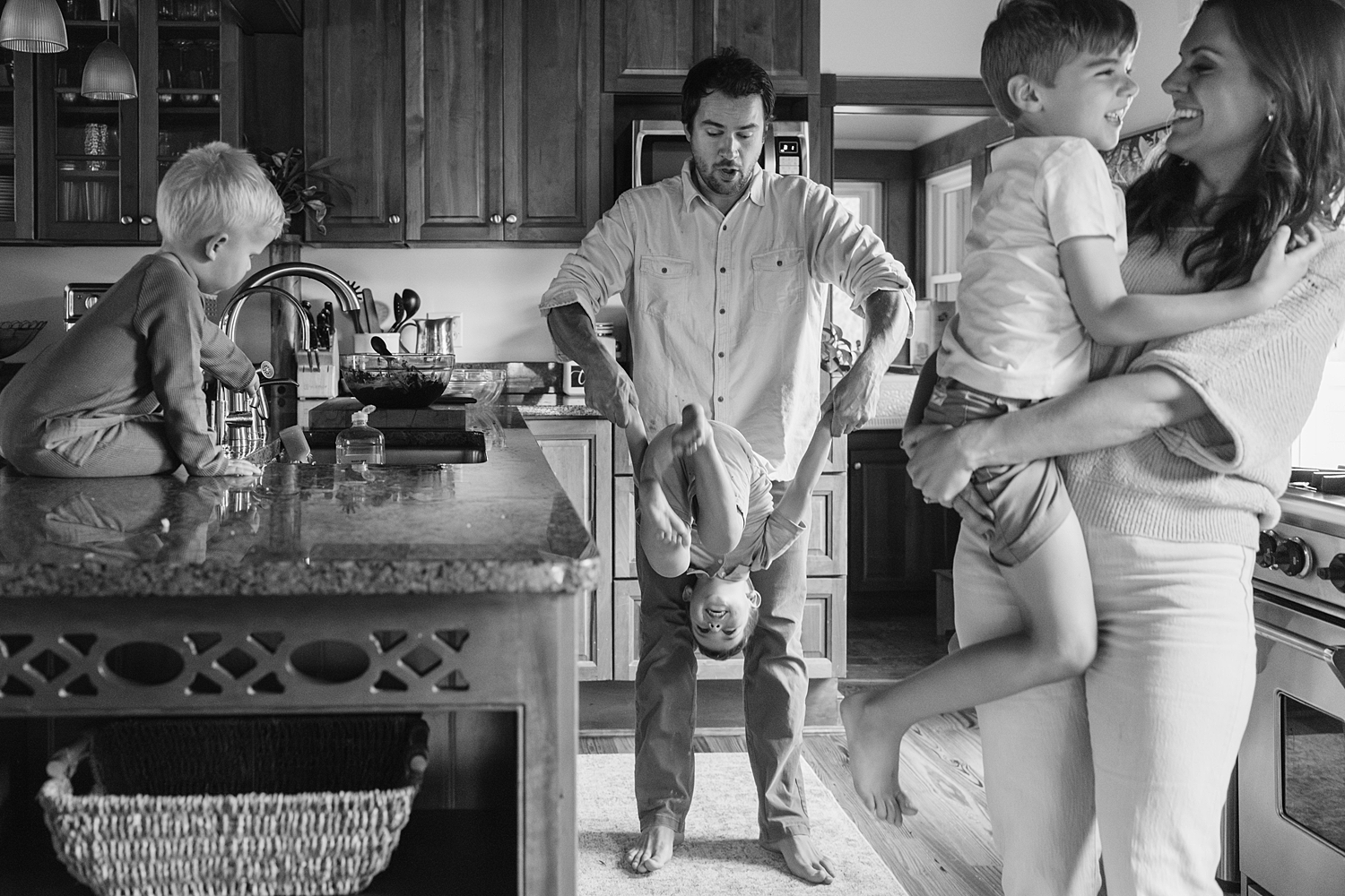 Northern Virginia family playing in the kitchen together.